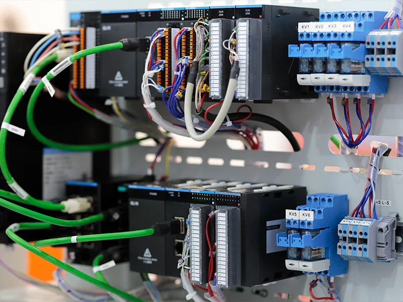 Industrial PLC automation modules with wiring in control panel